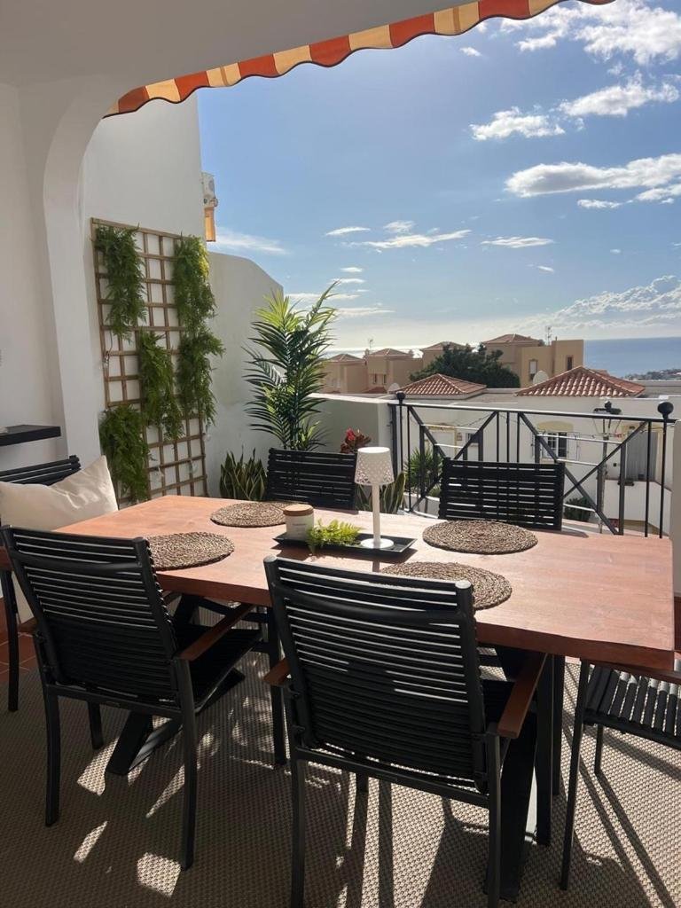 Terrace dining with a coastal view — Golden View Costa Adeje photo gallery