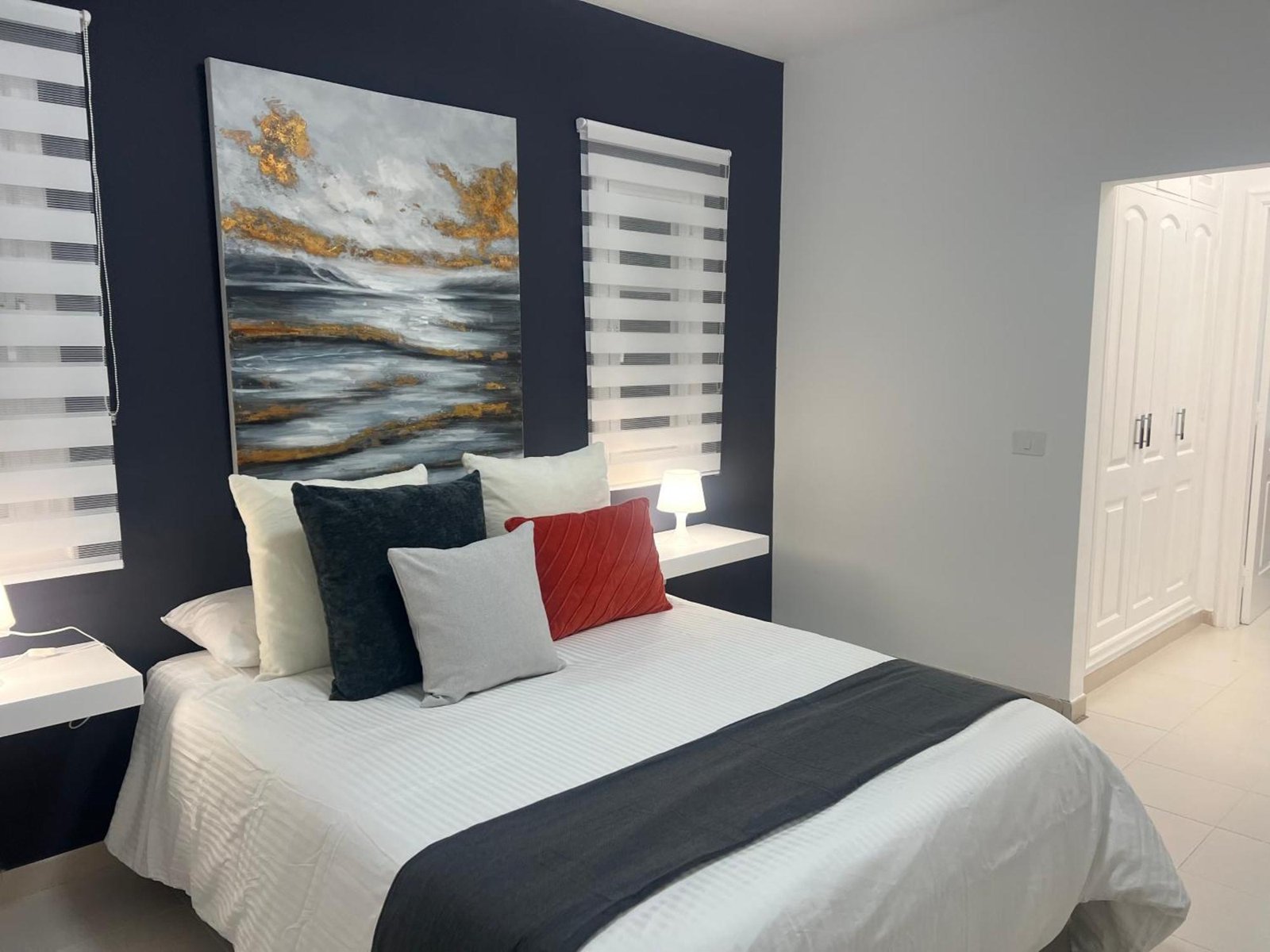Bedroom with coastal artwork — Golden View Costa Adeje photo gallery