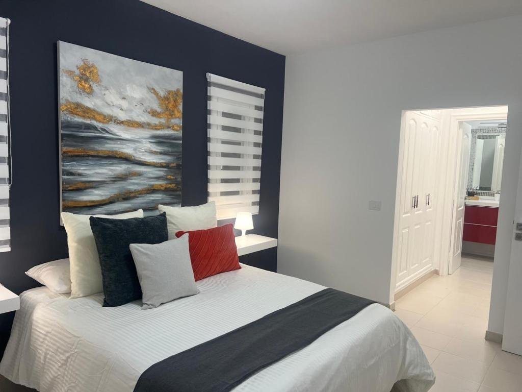 Bedroom with coastal artwork — Golden View Costa Adeje photo gallery