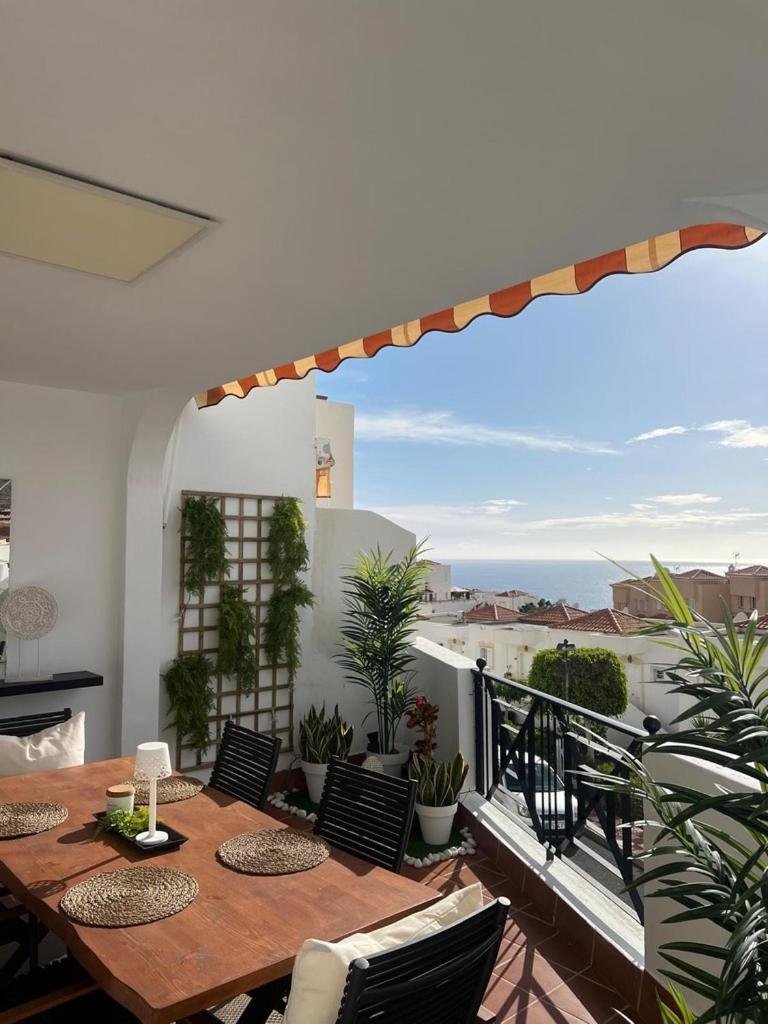 Covered terrace seating — Golden View Costa Adeje photo gallery