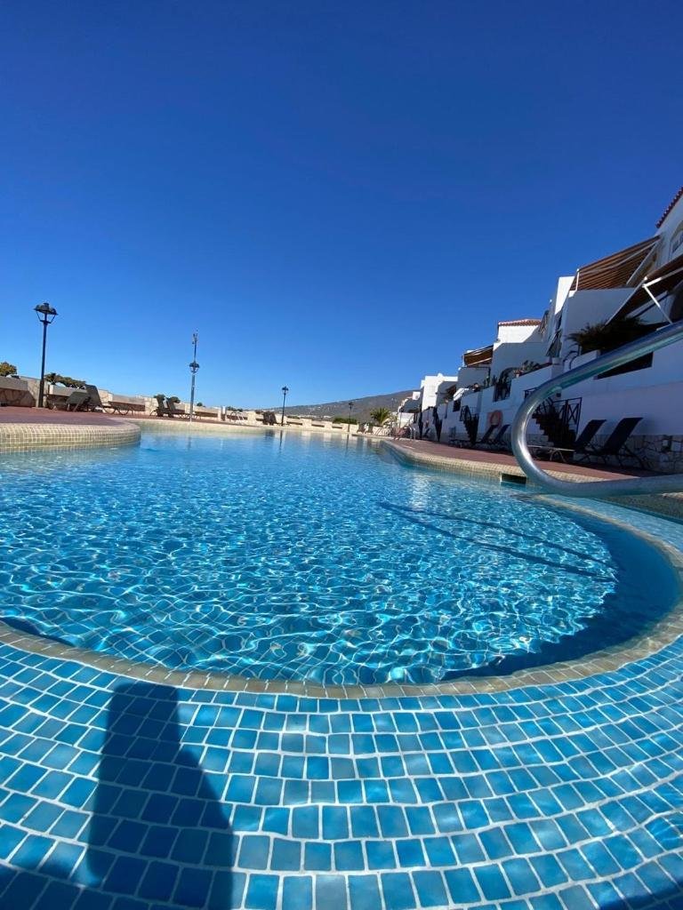 Swimming pool water and coastal outlook — Golden View Costa Adeje photo gallery